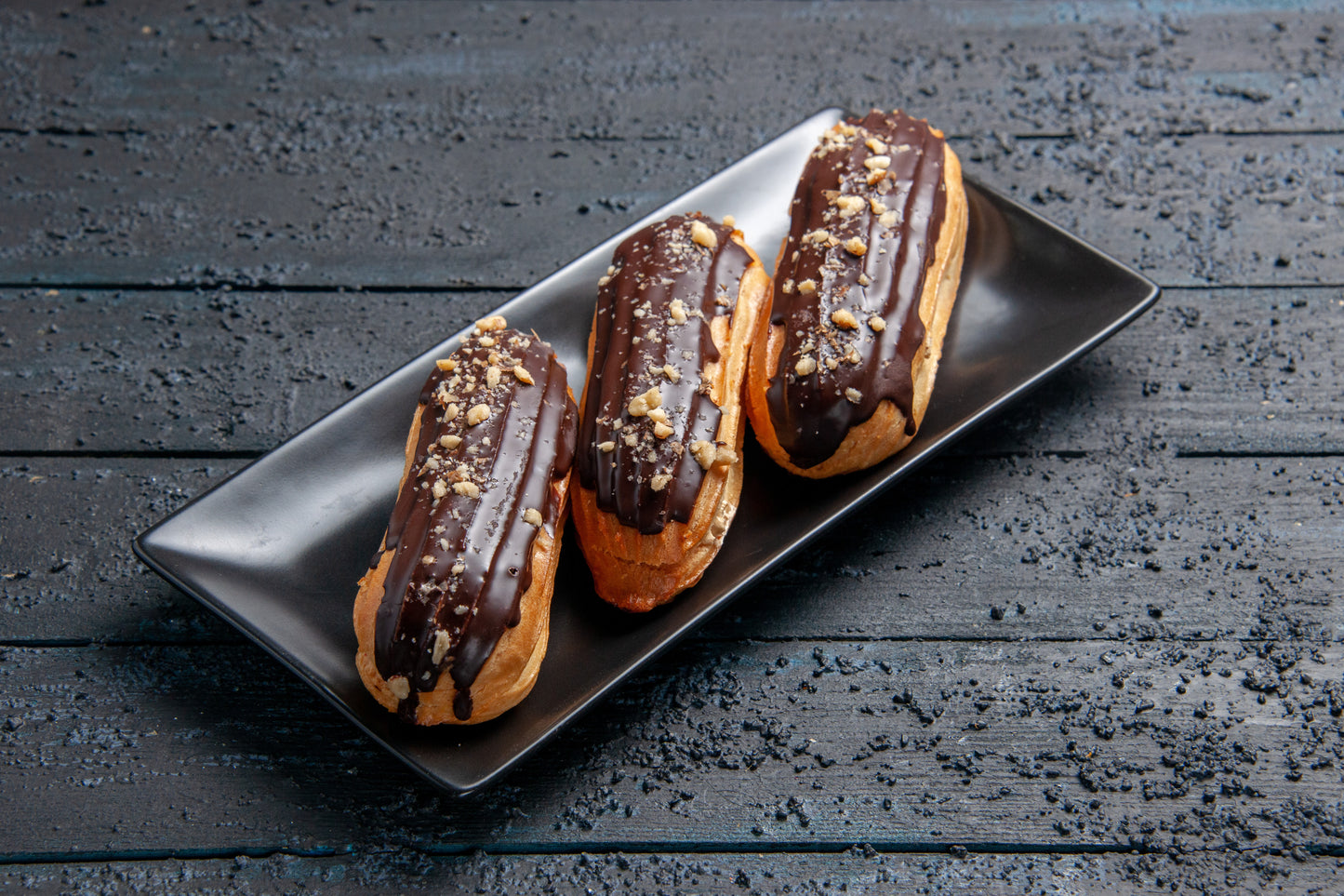 Profiteroles e éclairs preparados com mistura Cafés Serrano – sobremesas clássicas com toque profissional